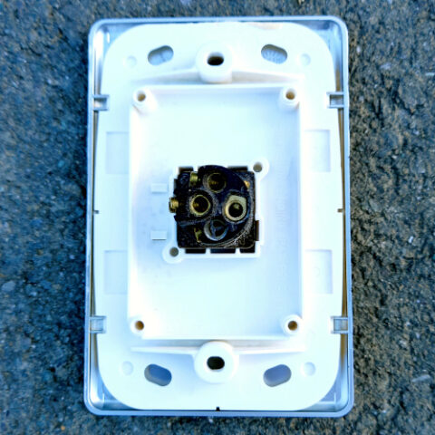 Clipsal C2000 Series 250V 10A flush switch with silver cover
