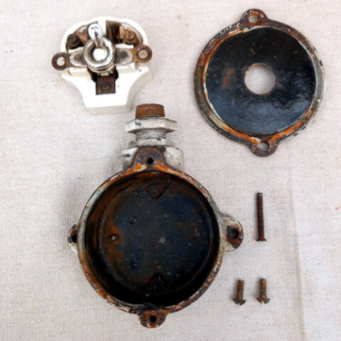 Vintage industrial-looking Exalt 5A 250V electrical switch made in England by G.C.