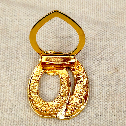 1990s gold-tone Suzanne Paul scarf clip with vintage styling