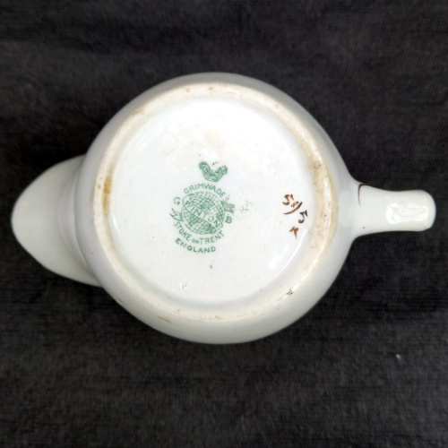Antique Grimwades Winton shaving mug with hand-painted yellow floral decoration and gold trim