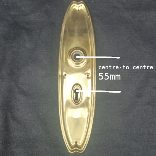 Antique brass door backplate manufactured in 1911, Rd 581065