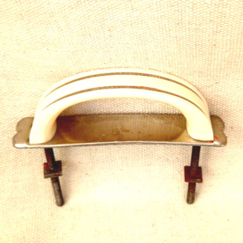 Art Deco ivory cream plastic drawer pull with chrome strip