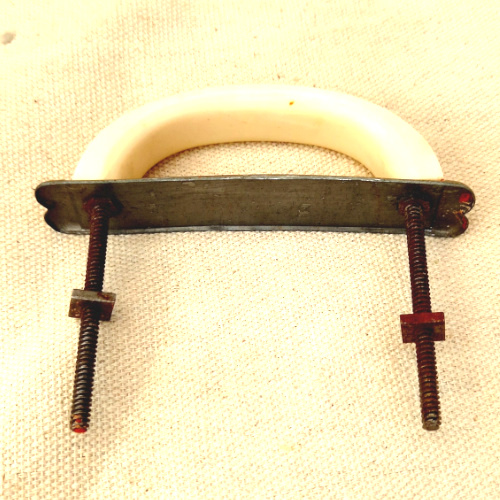 Art Deco ivory cream plastic drawer pull with chrome strip