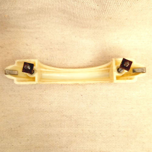 Art Deco ivory plastic pull handle with chrome strip, 77mm C/C