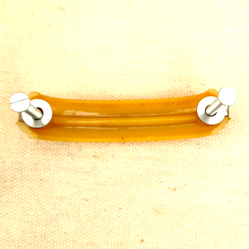 Art Deco honey coloured plastic pull handle with chrome strip and 65mm C/C
