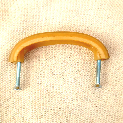 Art Deco honey coloured plastic pull handle with chrome strip and 65mm C/C