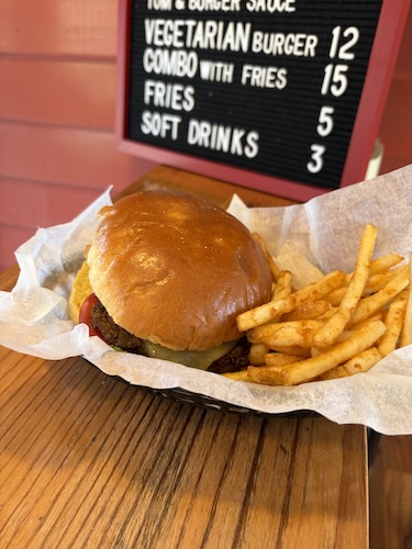 burger Smash burger with beef patty, bun and fillings from the Willow Bank Heritage Village Burger Bar