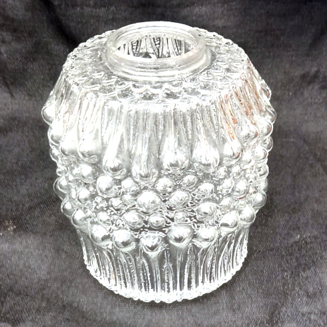 Vintage clear pressed glass tubular lamp shade with raised decorative patterns and ribbed detailing