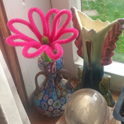 Colourful handmade flowers made from pipe cleaners