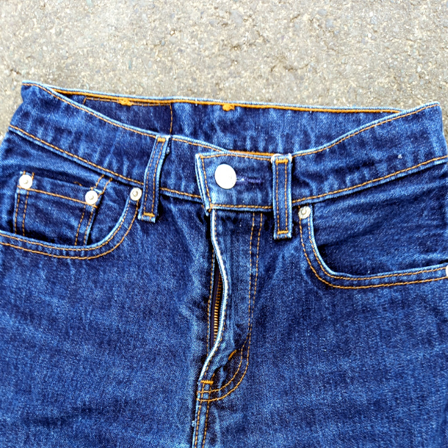 Shop vintage Levi’s 450 flared leg jeans, W25 L30, made in Australia. Classic vintage denim with a distinctive flared silhouette and red Levi’s tab.