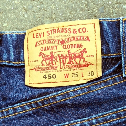 Shop vintage Levi’s 450 flared leg jeans, W25 L30, made in Australia. Classic vintage denim with a distinctive flared silhouette and red Levi’s tab.
